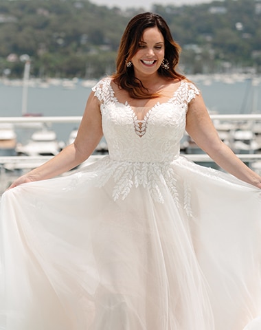 Curvy Brides of St John Canada will fall in love with Diva Curves By Peter  Trends Bridal